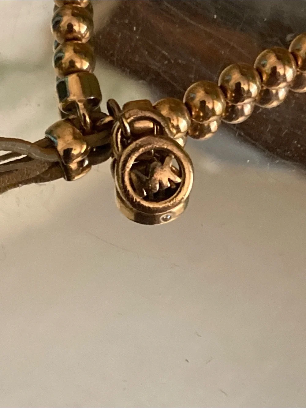 Michael Kors Gold-Tone Beaded Slider Bracelet with Logo Charm w/Leather Pull
